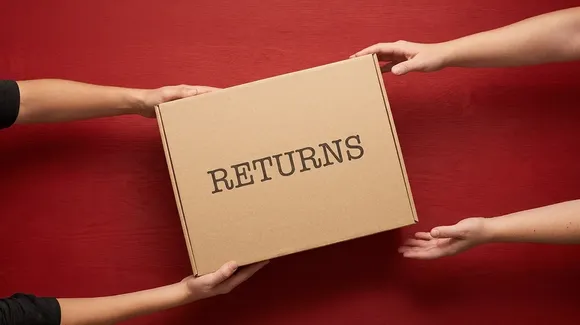 Two people exchange a cardboard box labeled "RETURNS" against a solid red background.