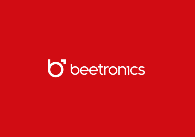 White "beetronics" logo with a stylized lowercase "b" on a solid red background.
