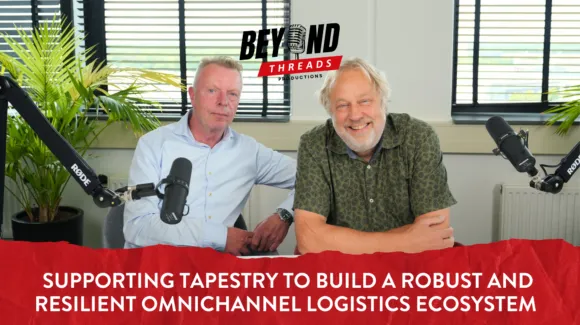 Two men sit at a table with microphones in a studio setting, with the text “SUPPORTING TAPESTRY TO BUILD A ROBUST AND RESILIENT OMNICHANNEL LOGISTICS ECOSYSTEM” displayed below.