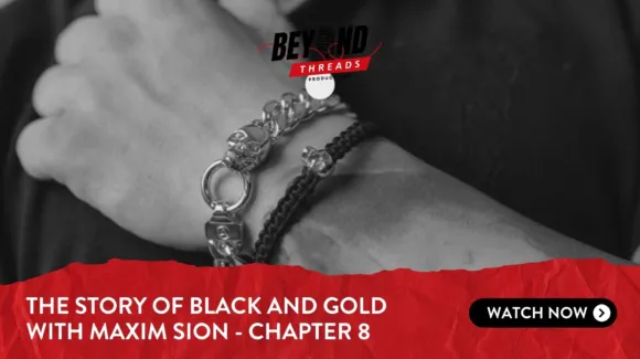 A close-up of a person's wrist wearing silver and black bracelets, with text promoting "The Story of Black and Gold with Maxim Sion - Chapter 8" and a "Watch Now" button.