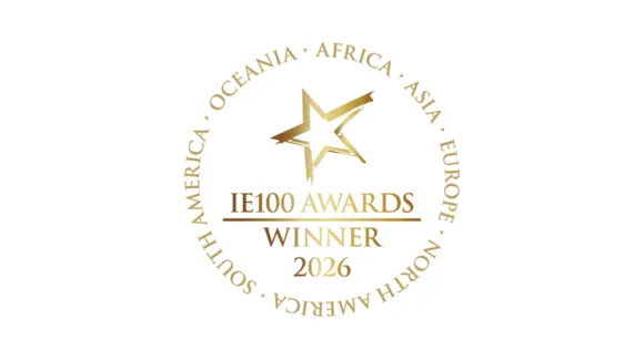 Gold star emblem with text "IE100 Awards Winner 2026" encircled by the continents: Oceania, Africa, Asia, Europe, North America, and South America.