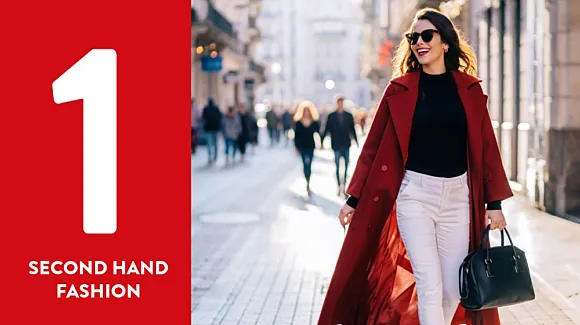 A woman in a red coat and sunglasses walks down a city street, carrying a black handbag. A large number one and the words "Second Hand Fashion" appear on a red background.