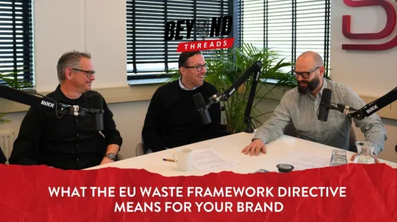 Three men sit at a podcast table with microphones, discussing the EU Waste Framework Directive and its impact on brands, as shown by the onscreen text.