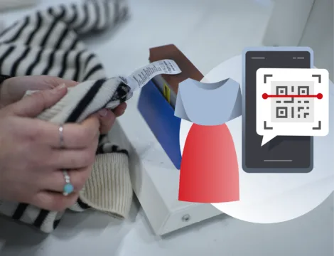 Closeup of woman checking clothing label