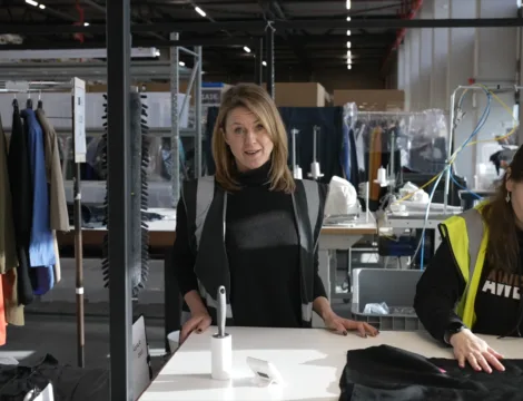 Two women in a repair shop