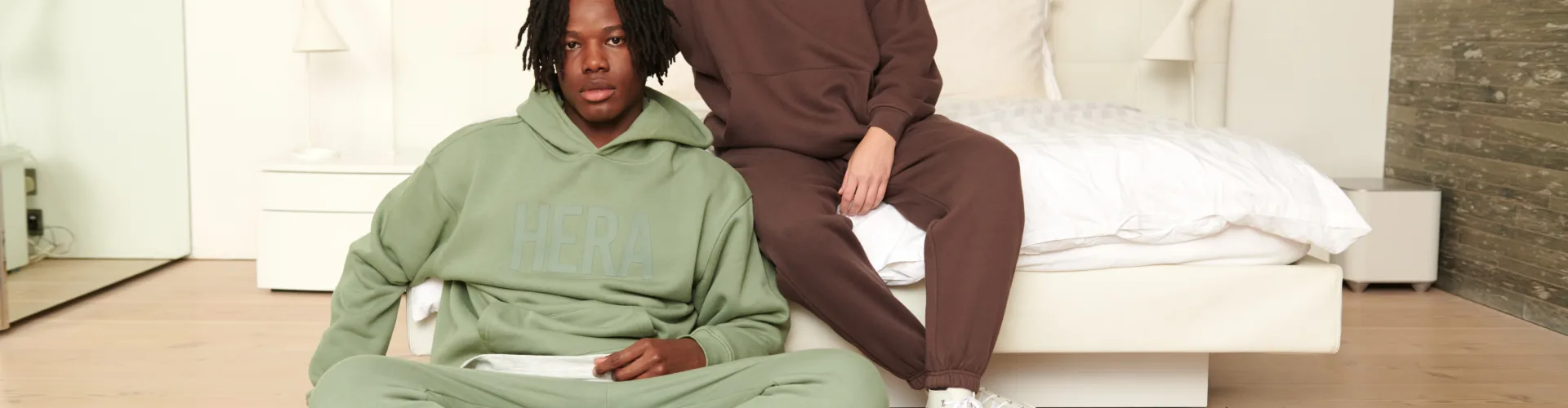 Man en women posing in Hera clothing