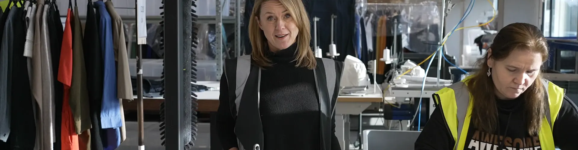 Two women in a repair shop